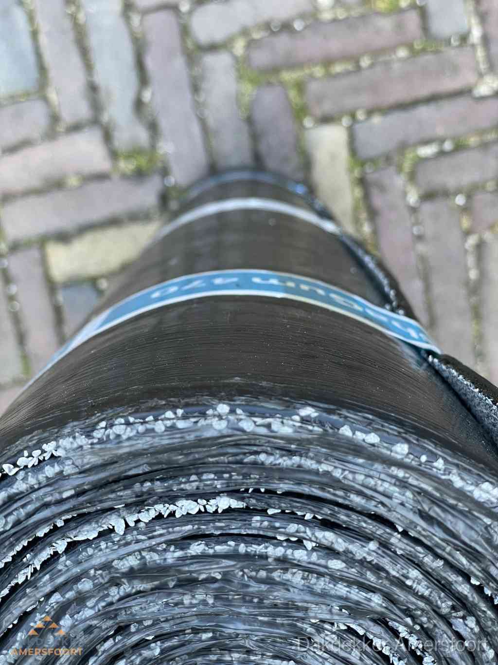 Rol bitumen dakleer met leislag voor plat dak in Amersfoort